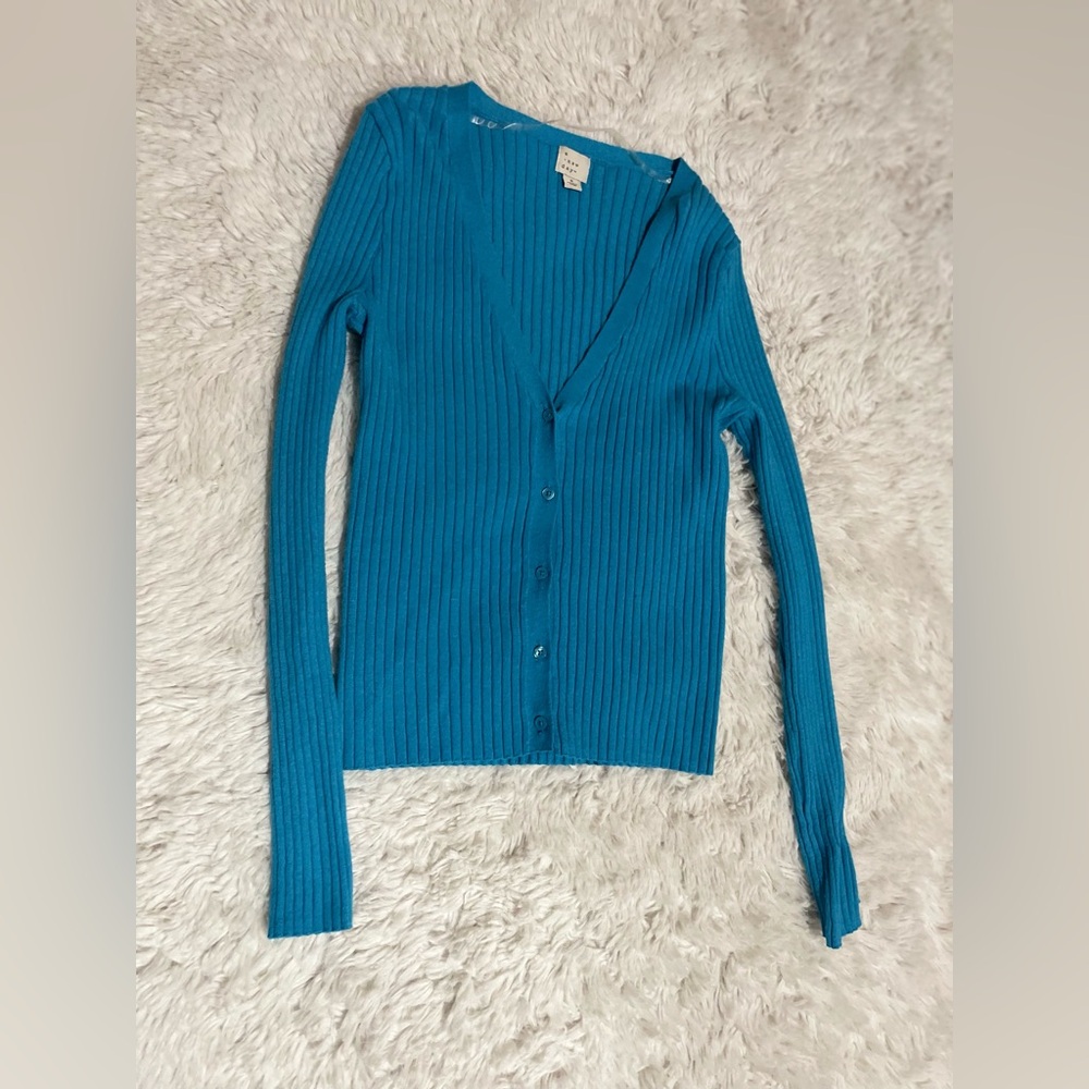 And new day blue sweater
